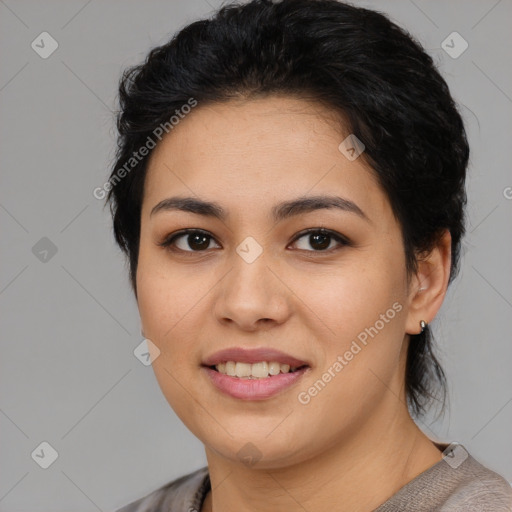 Joyful asian young-adult female with medium  black hair and brown eyes