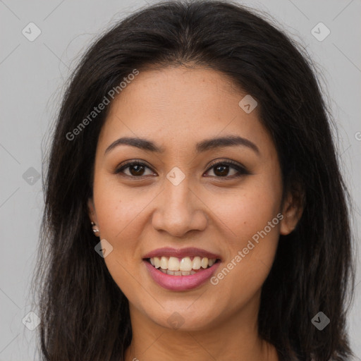 Joyful latino young-adult female with long  brown hair and brown eyes