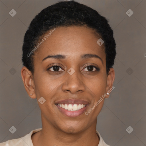 Joyful black young-adult female with short  brown hair and brown eyes