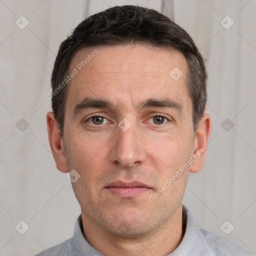 Neutral white adult male with short  brown hair and brown eyes