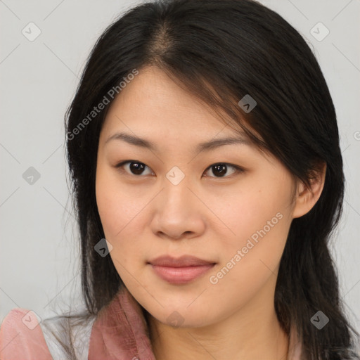 Joyful asian young-adult female with long  brown hair and brown eyes