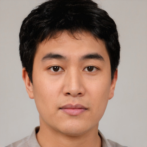 Neutral asian young-adult male with short  black hair and brown eyes