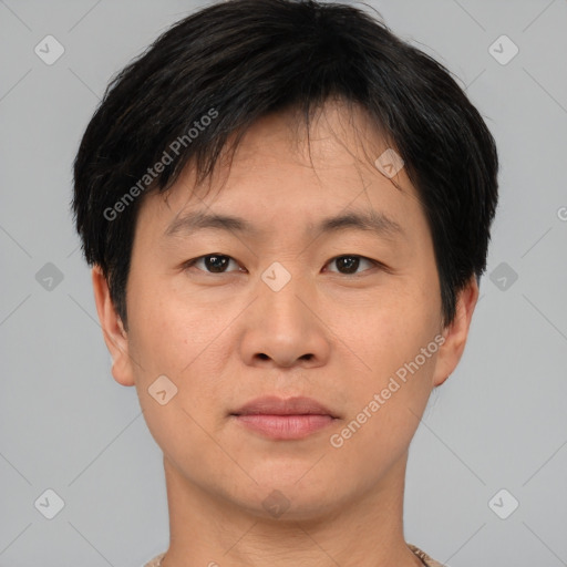 Neutral asian young-adult male with short  brown hair and brown eyes