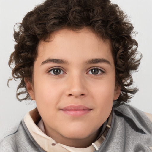 Joyful white child female with short  brown hair and brown eyes