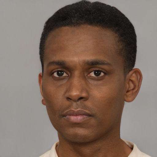 Neutral black young-adult male with short  brown hair and brown eyes