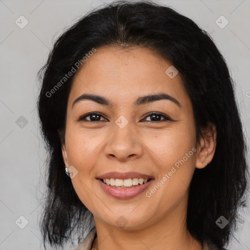 Joyful latino young-adult female with medium  brown hair and brown eyes