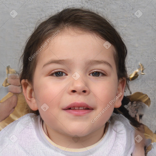 Joyful white child female with medium  brown hair and brown eyes