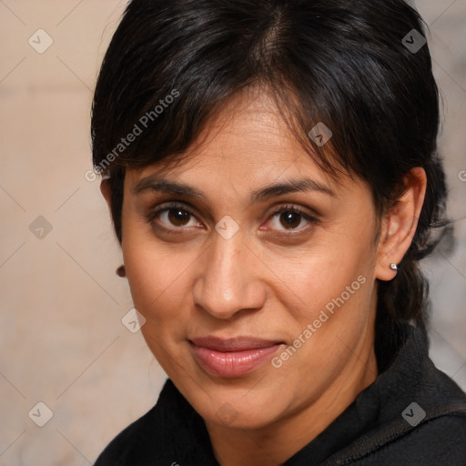 Joyful white adult female with medium  brown hair and brown eyes