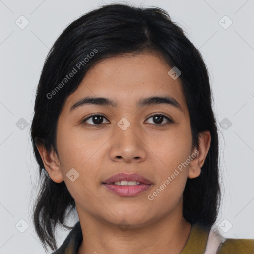 Joyful asian young-adult female with medium  black hair and brown eyes