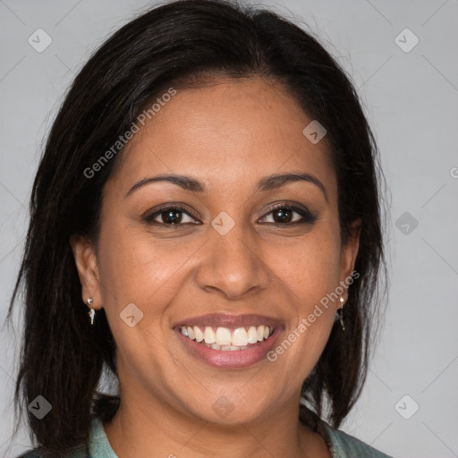 Joyful white adult female with medium  brown hair and brown eyes