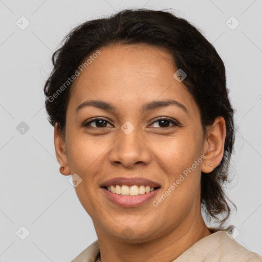 Joyful latino young-adult female with short  brown hair and brown eyes