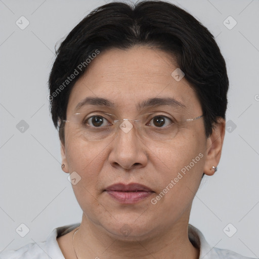 Joyful white adult female with short  brown hair and brown eyes