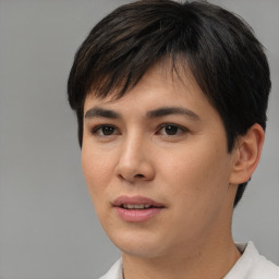 Joyful asian young-adult female with short  brown hair and brown eyes