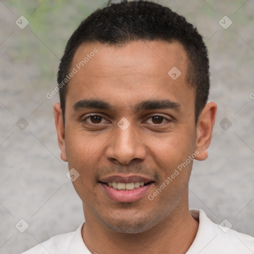 Joyful latino young-adult male with short  black hair and brown eyes