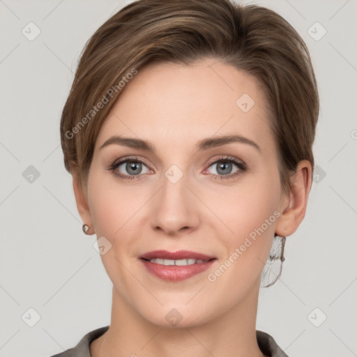 Joyful white young-adult female with short  brown hair and grey eyes