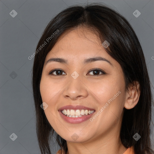 Joyful white young-adult female with long  brown hair and brown eyes