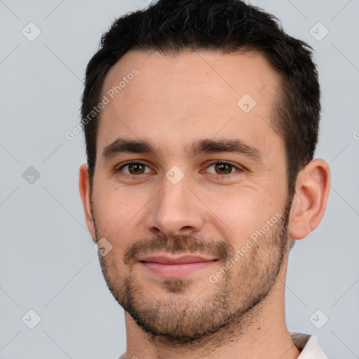 Joyful white young-adult male with short  brown hair and brown eyes