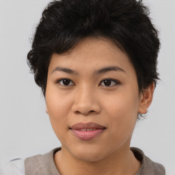 Joyful asian young-adult female with short  black hair and brown eyes