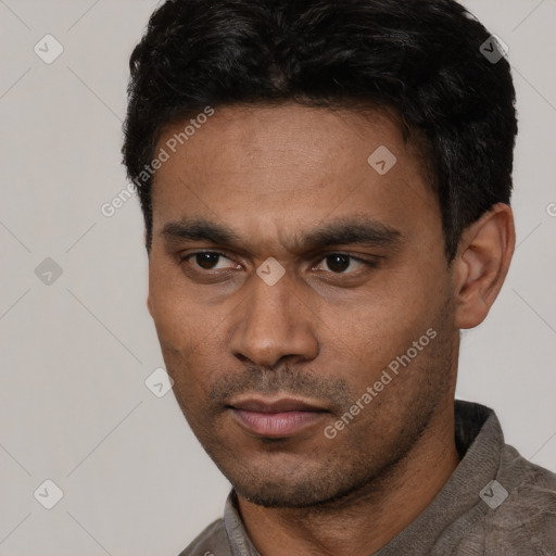 Neutral latino young-adult male with short  black hair and brown eyes