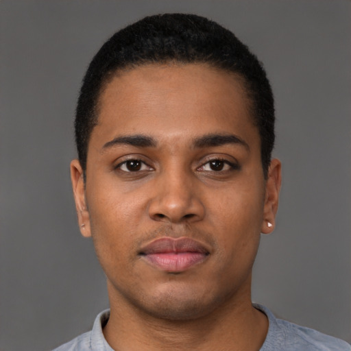 Neutral latino young-adult male with short  brown hair and brown eyes