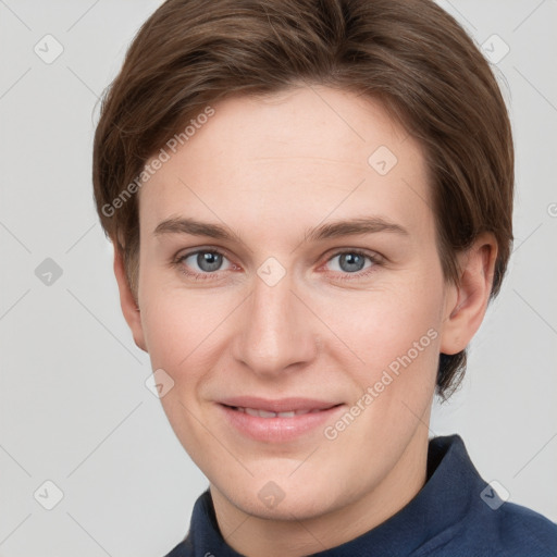 Joyful white young-adult female with short  brown hair and grey eyes