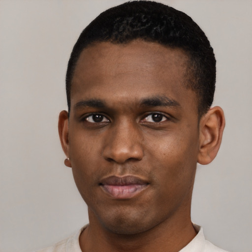 Neutral black young-adult male with short  black hair and brown eyes