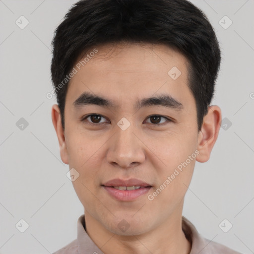 Joyful white young-adult male with short  black hair and brown eyes