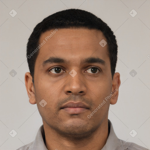 Neutral latino young-adult male with short  black hair and brown eyes