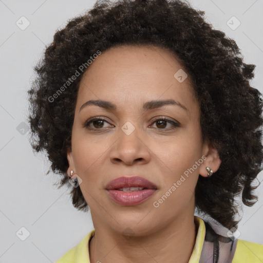 Joyful black young-adult female with medium  brown hair and brown eyes