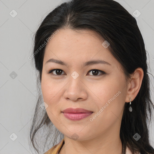 Joyful asian young-adult female with medium  brown hair and brown eyes