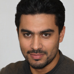 Neutral white young-adult male with short  black hair and brown eyes