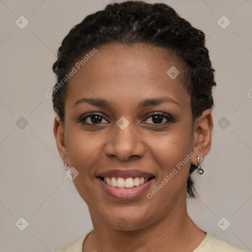 Joyful black young-adult female with short  brown hair and brown eyes