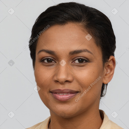 Joyful latino young-adult female with short  brown hair and brown eyes