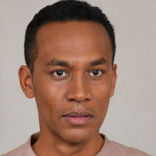 Neutral black young-adult male with short  black hair and brown eyes