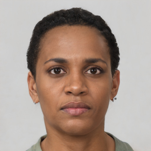 Neutral latino young-adult female with short  black hair and brown eyes