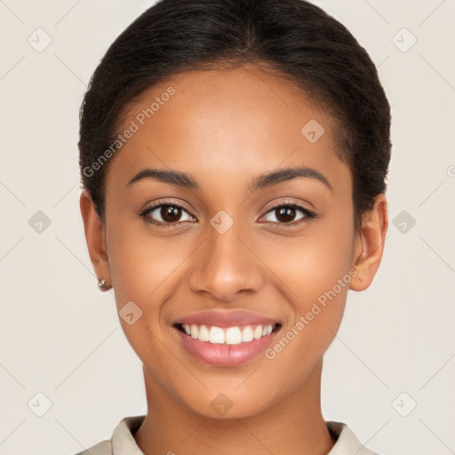 Joyful latino young-adult female with short  brown hair and brown eyes