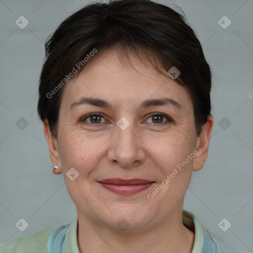 Joyful white adult female with short  brown hair and brown eyes