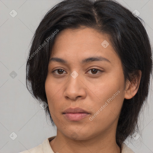 Neutral asian young-adult female with medium  brown hair and brown eyes