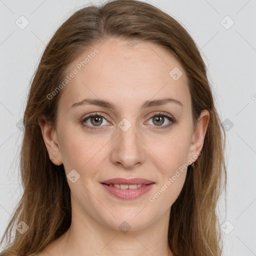 Joyful white young-adult female with long  brown hair and green eyes