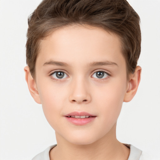 Joyful white child female with short  brown hair and brown eyes