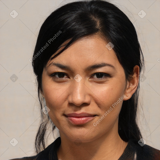 Joyful asian young-adult female with medium  black hair and brown eyes