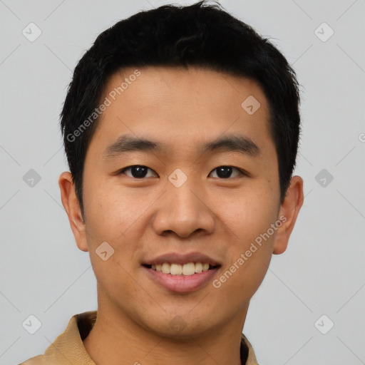 Joyful asian young-adult male with short  black hair and brown eyes