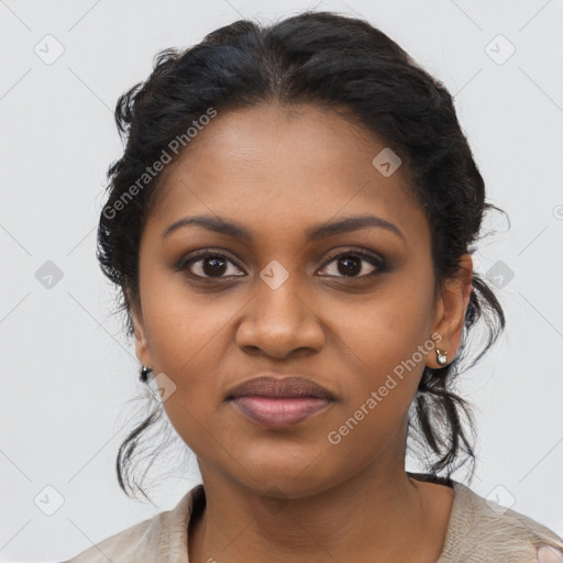 Joyful black young-adult female with long  brown hair and brown eyes