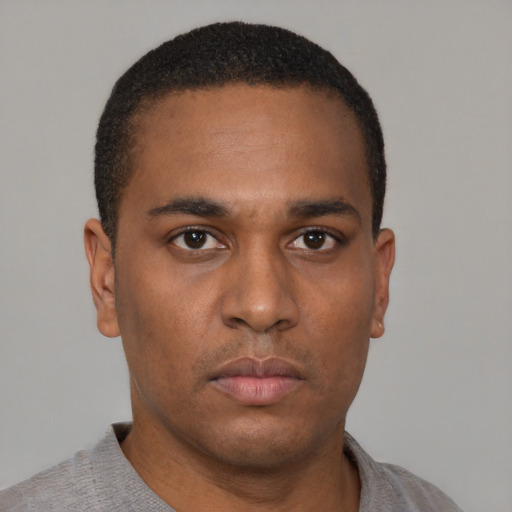 Neutral latino young-adult male with short  brown hair and brown eyes