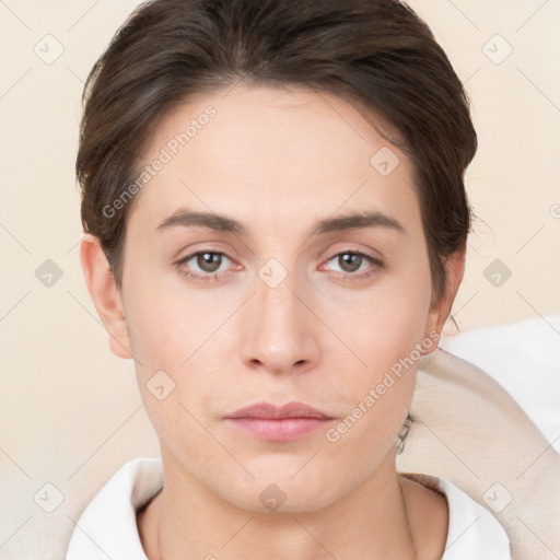 Neutral white young-adult female with short  brown hair and brown eyes