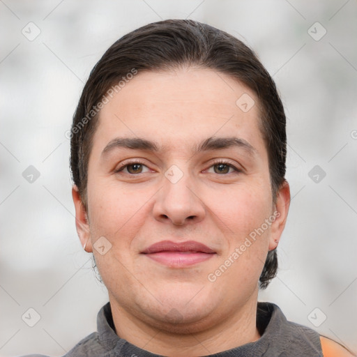 Joyful white young-adult female with short  brown hair and brown eyes