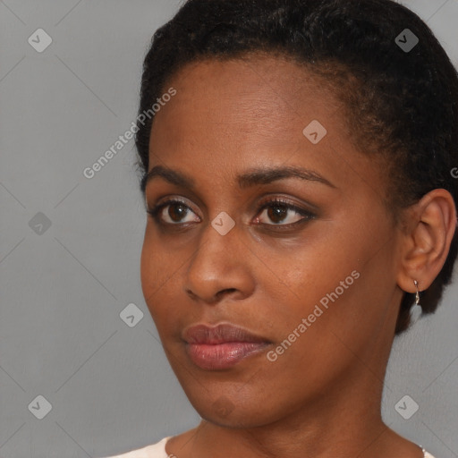 Neutral black young-adult female with short  brown hair and brown eyes