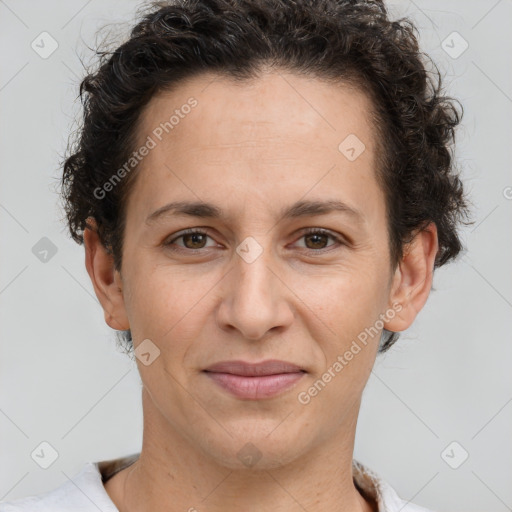 Joyful white adult female with short  brown hair and brown eyes