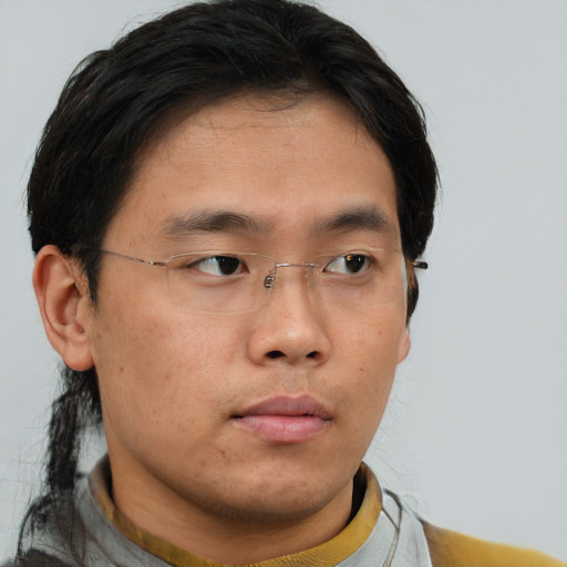 Neutral asian young-adult male with short  brown hair and brown eyes