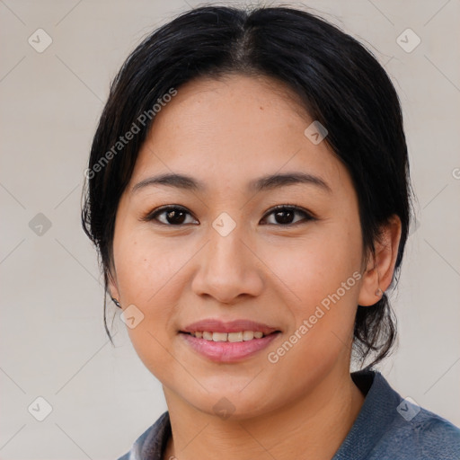 Joyful asian young-adult female with medium  brown hair and brown eyes